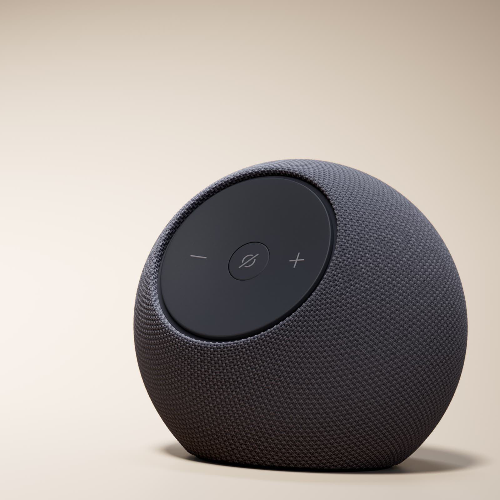 Altavoz Amazon Echo Dot Max en gris grafito sobre fondo beis, con los botones de volumen y micrófono a la vista