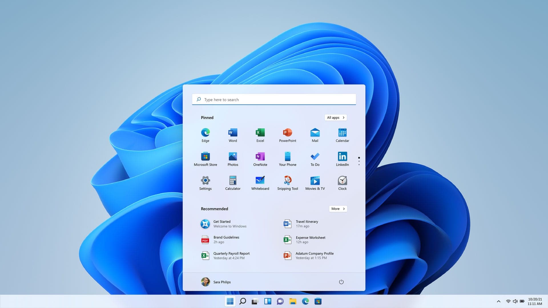 Escritorio de Windows 11 con el menú Inicio abierto sobre el fondo azul Bloom