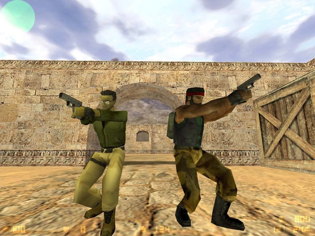 Dos terroristas disparan en el mapa Dust de Counter-Strike, con los gráficos originales